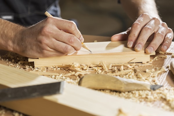 Carpenter working with wood
